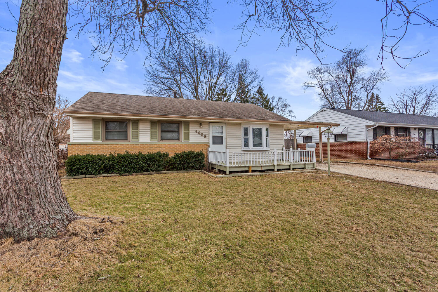 1468 Mather Drive Rantoul, IL 61866 - Photo 2 of 23 a house with trees in the background