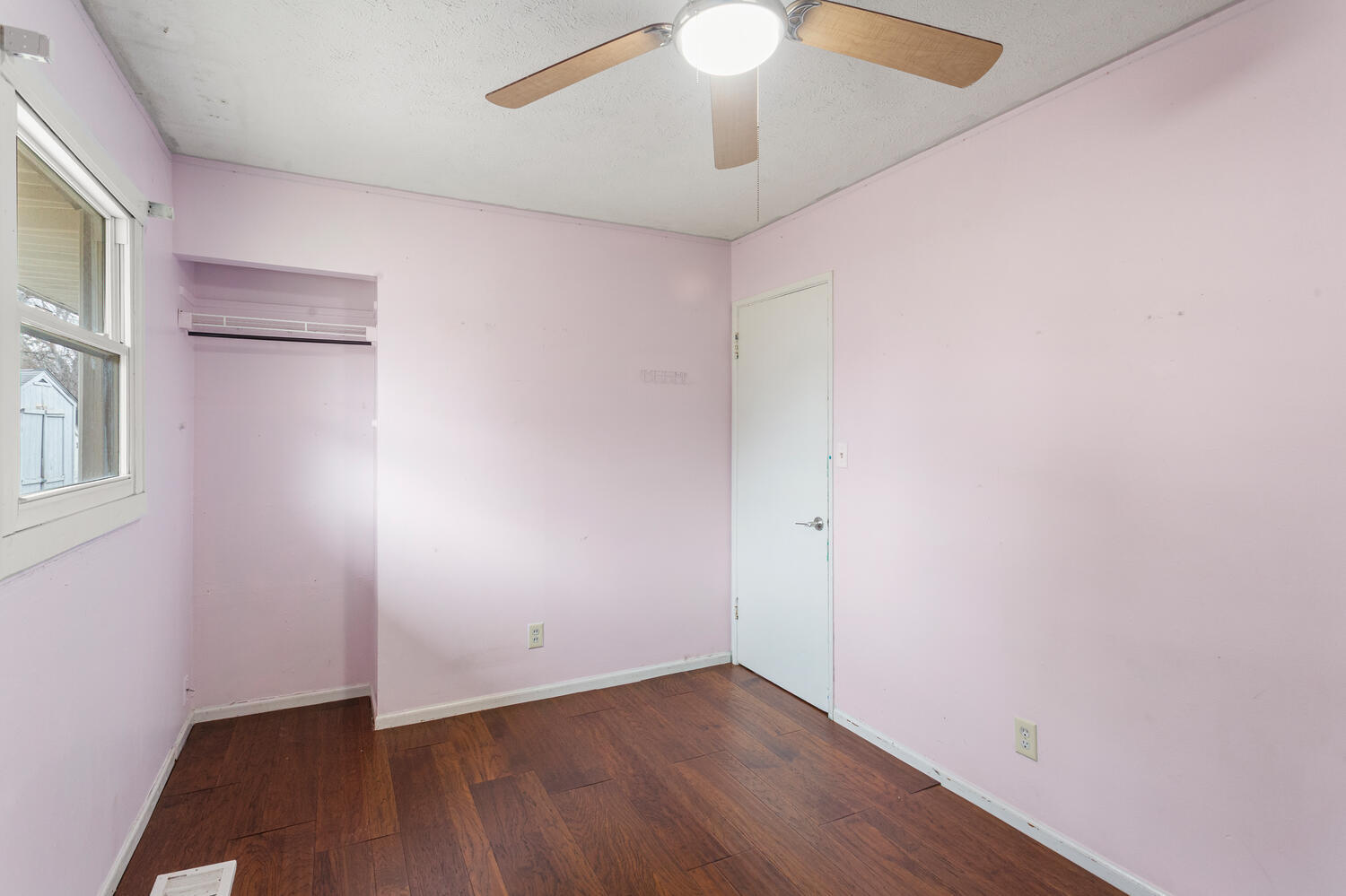 1468 Mather Drive Rantoul, IL 61866 - Photo 21 of 23 a view of an empty room with wooden floor and a window