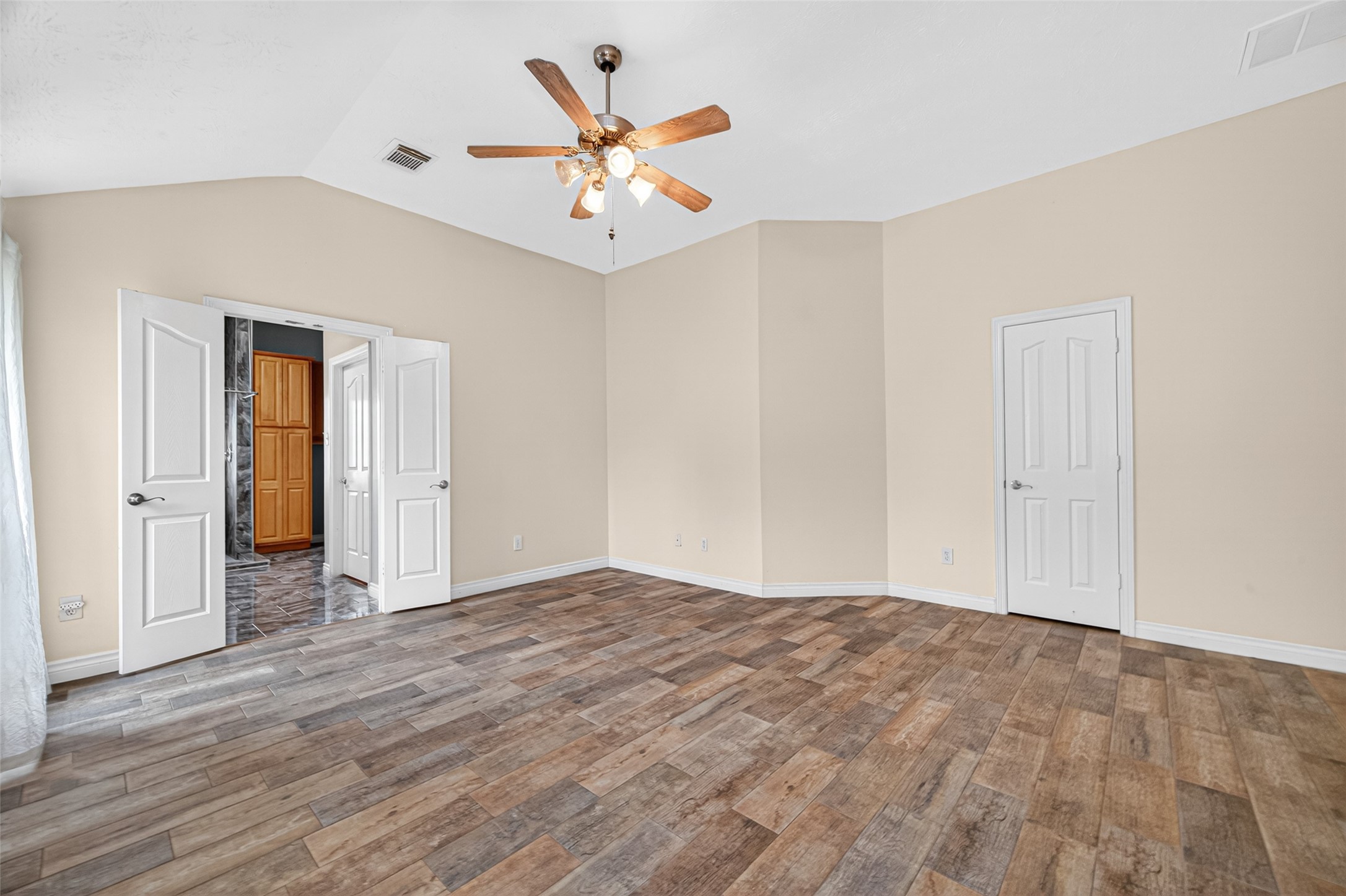 23914 Glengate Drive Spring, TX 77373 - Photo 23 of 49 a view of an empty room with wooden floor