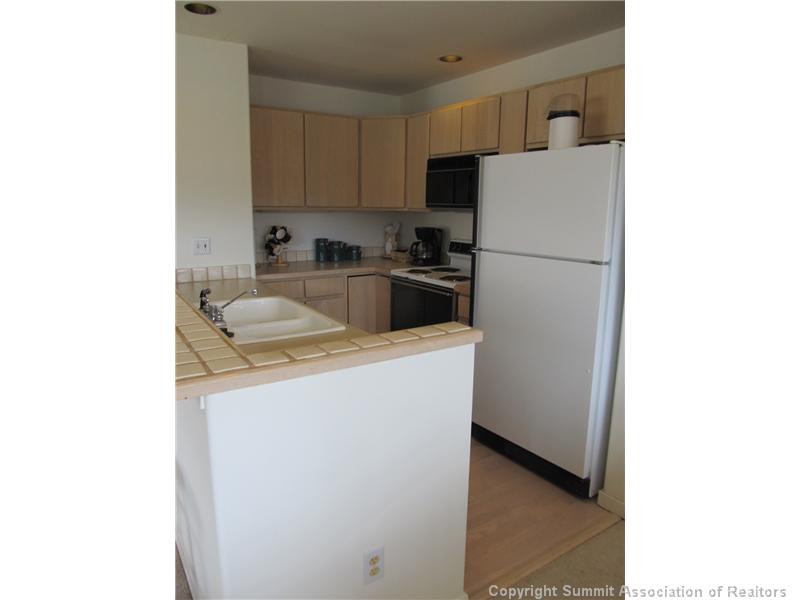 95611 Ryan Gulch Road, Unit 626 Silverthorne, CO 80498 - Photo 20 of 21 Kitchen.