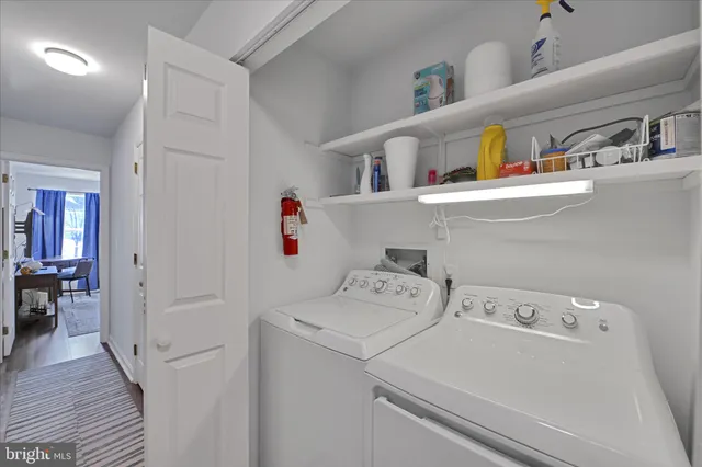 a storage room with washer and dryer