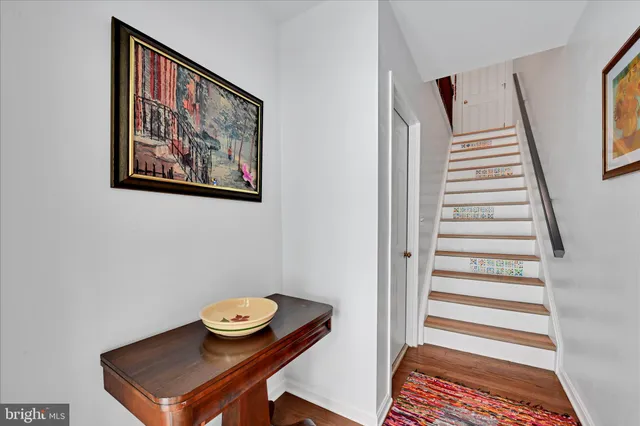 a view of a workspace with furniture and entryway