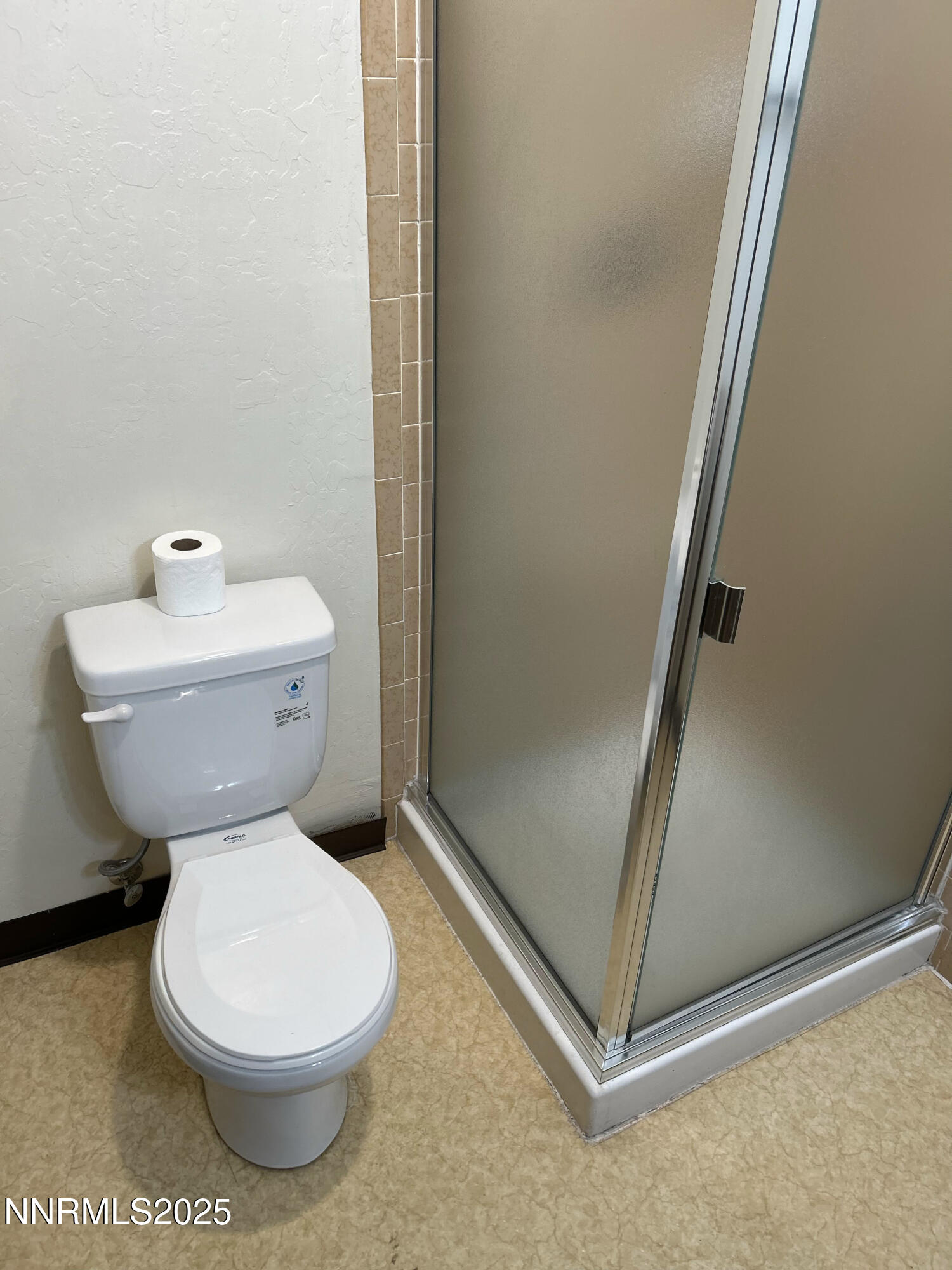 1000 Beck Drive, Unit 361 Reno, NV 89509 - Photo 16 of 32 a white toilet sitting next to a bathroom sink