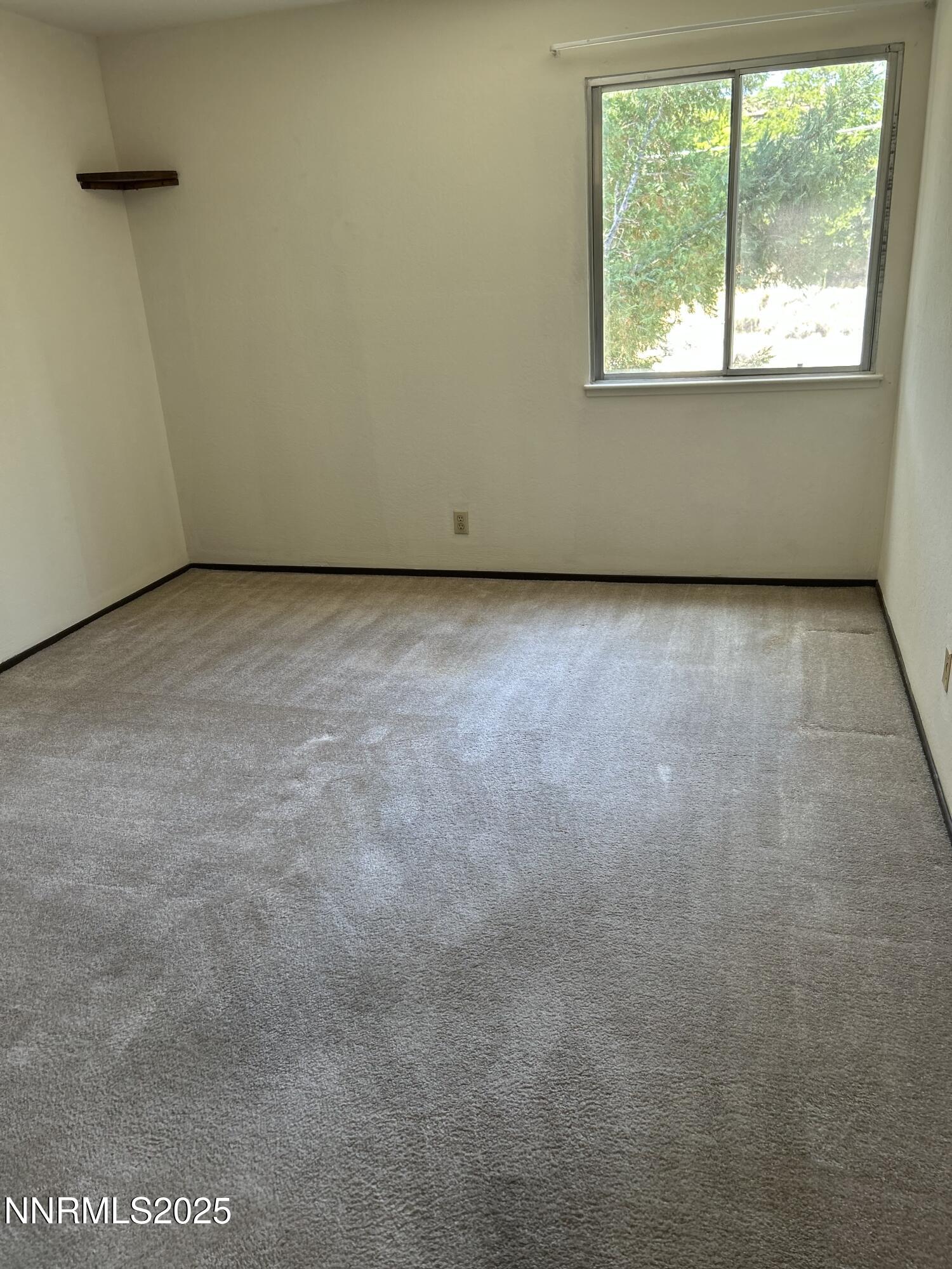 1000 Beck Drive, Unit 361 Reno, NV 89509 - Photo 21 of 32 an empty room with a window
