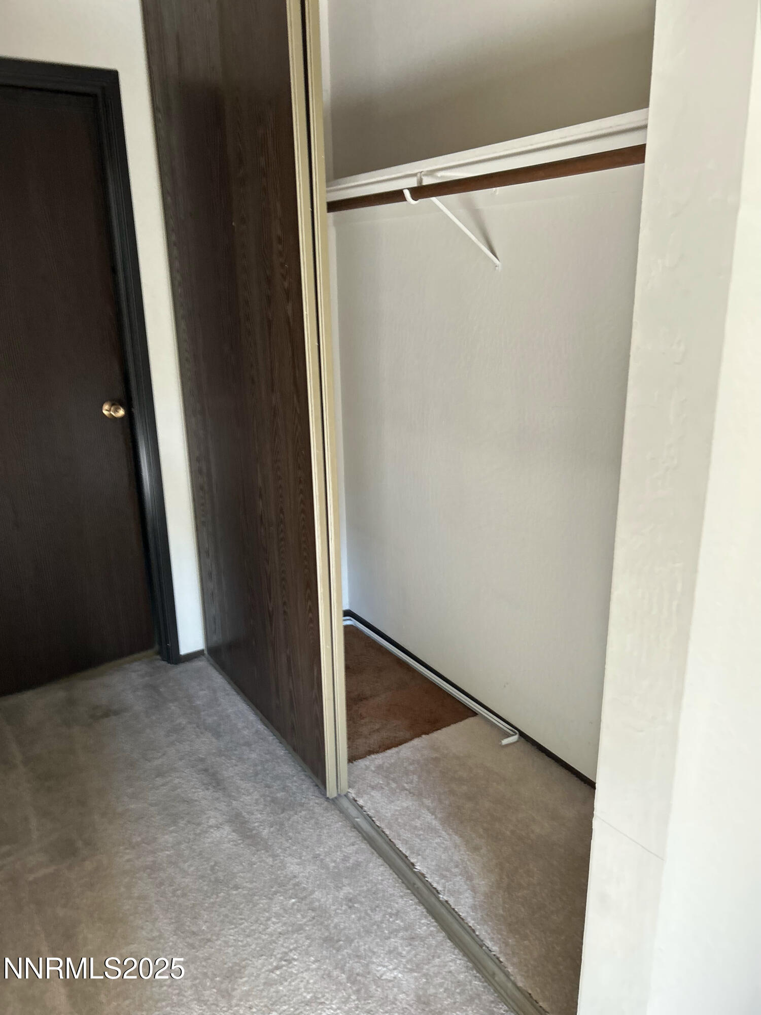 1000 Beck Drive, Unit 361 Reno, NV 89509 - Photo 24 of 32 an empty room with wooden floor