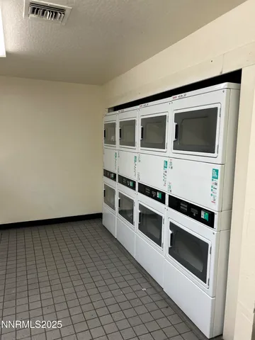 a room with a couch and a shower curtain