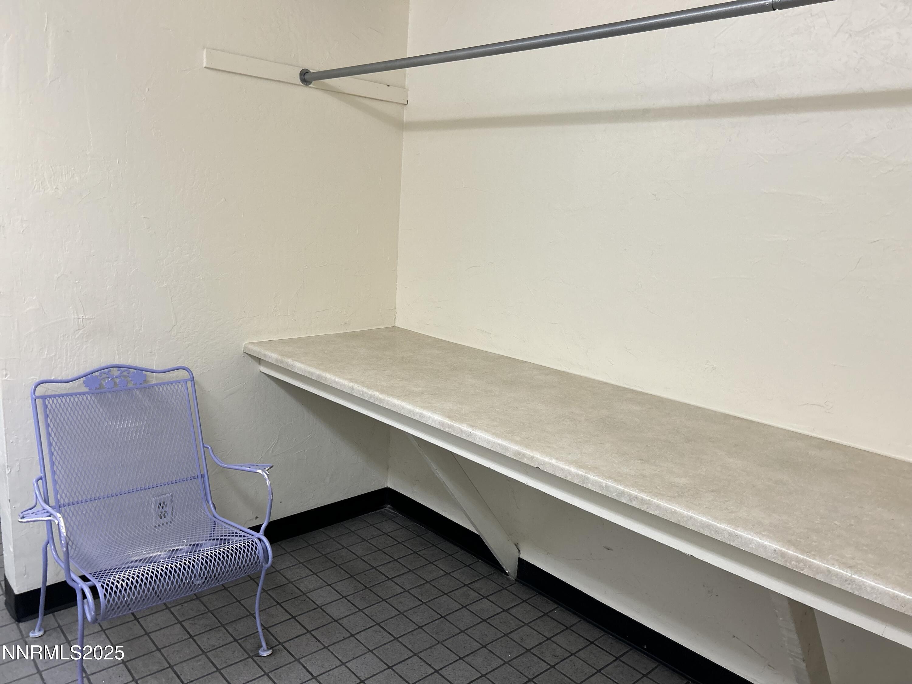 1000 Beck Drive, Unit 361 Reno, NV 89509 - Photo 29 of 32 a room with a couch and a shower curtain