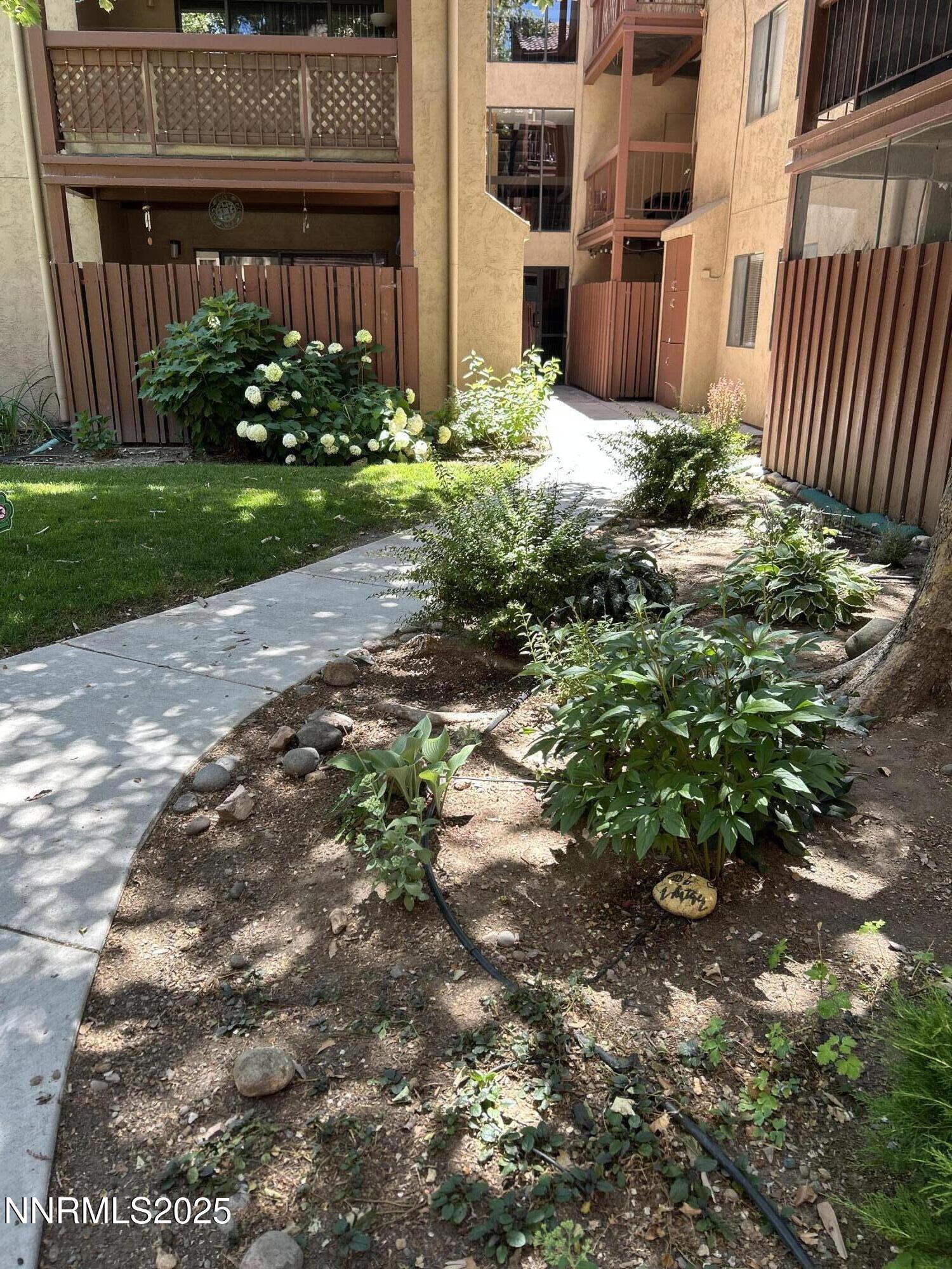 1000 Beck Drive, Unit 361 Reno, NV 89509 - Photo 30 of 32 a view of a house with a yard