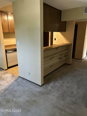 a view of a livingroom with furniture