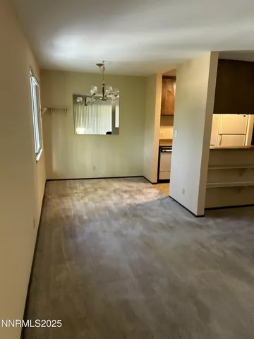 a view of a room with a window