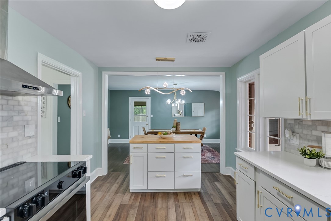 1136 Overbrook Road Petersburg, VA 23805 - Photo 19 of 51 Updated kitchen featuring white shaker cabinetry,