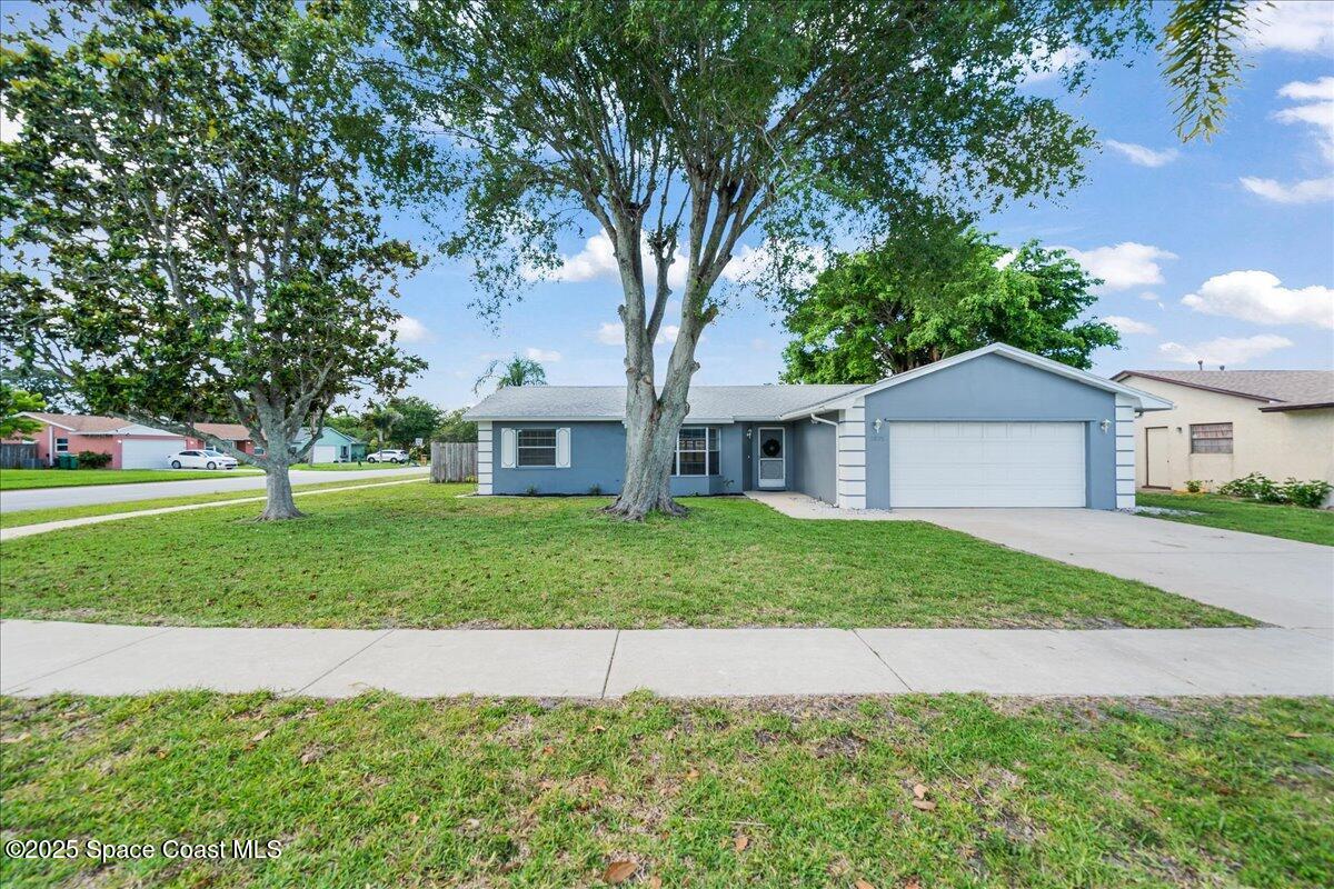 1871 Talloak Road Melbourne, FL 32935 - Photo 1 of 32 Front of the property