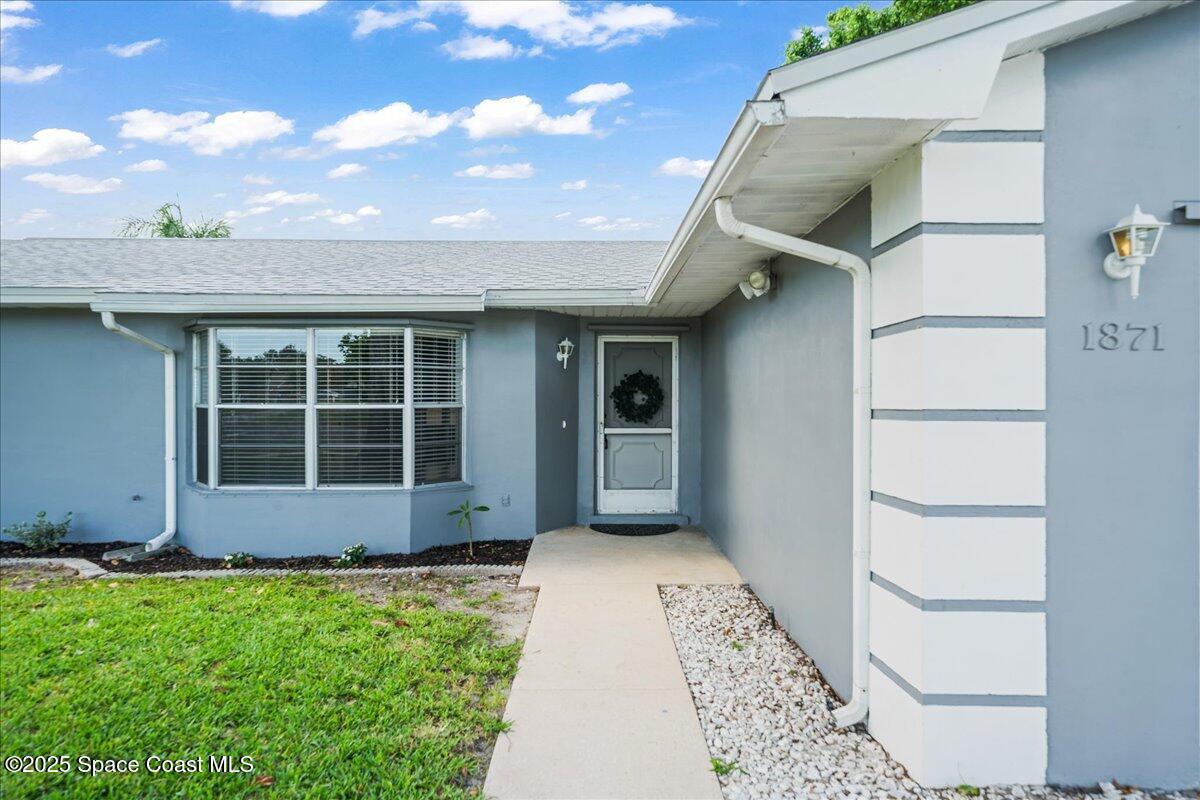 1871 Talloak Road Melbourne, FL 32935 - Photo 3 of 32 06-untitled-07410