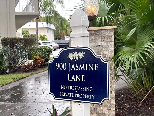 a sign that is sitting on the side of a street