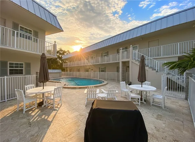 a view of balcony with patio