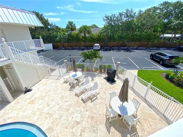 a view of swimming pool with patio