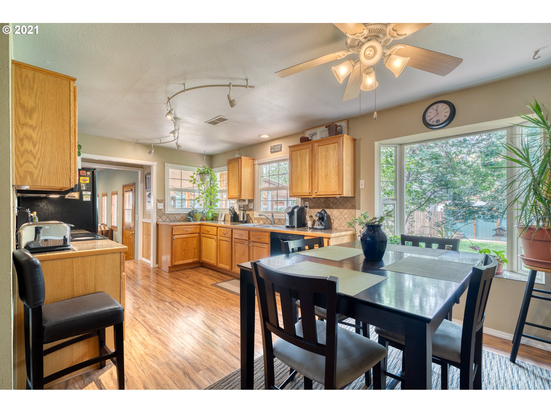 19382 Indian Summer Road Bend, OR 97702 - Photo 10 of 23 a view of a dining room with furniture window and outside view