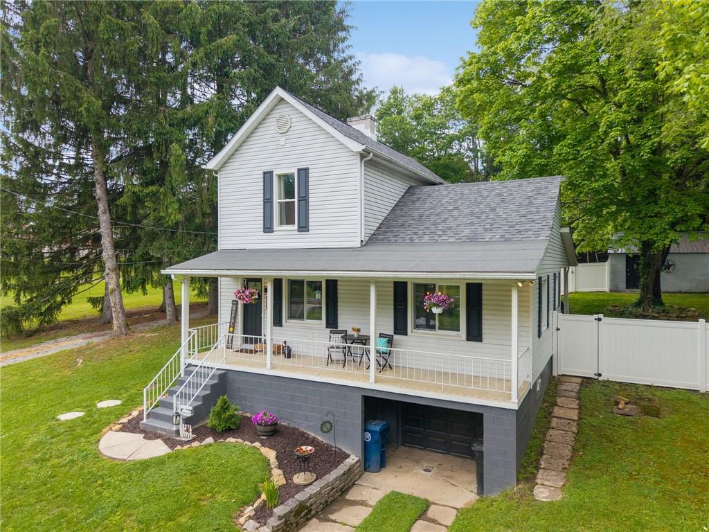 1008 Small Road Jeannette, PA 15644 - Photo 34 of 37 Large front porch. Privacy fence.