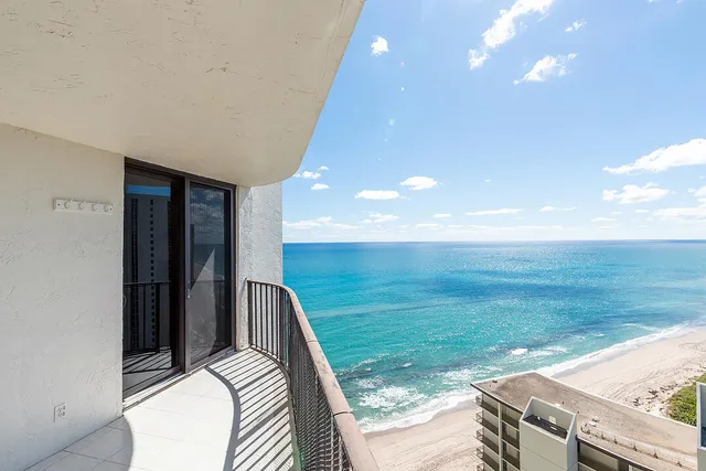 a view of a balcony with an outdoor space
