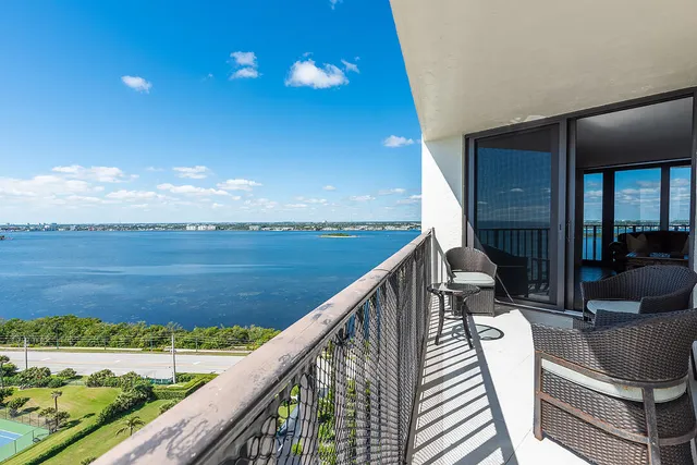 a view of balcony with furniture
