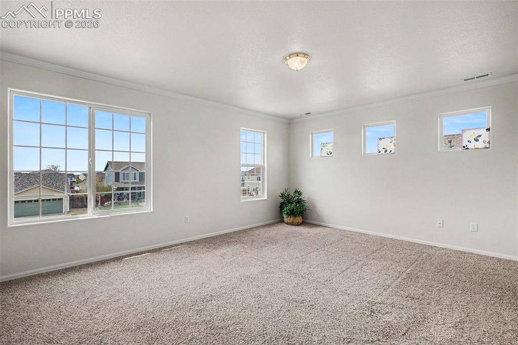 12210 Crystal Downs Road Peyton, CO 80831 - Photo 15 of 40 a view of an empty room with a window