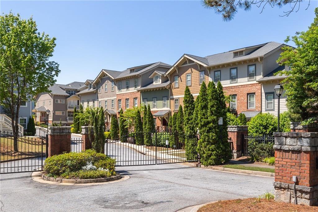 2178 Wiggins Walk Atlanta, GA 30316 - Photo 25 of 31 a front view of a building with a garden