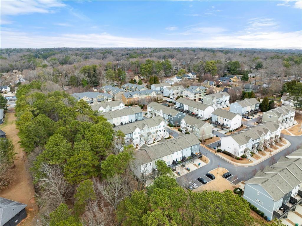 2178 Wiggins Walk Atlanta, GA 30316 - Photo 26 of 31 an aerial view of residential houses with outdoor space and trees