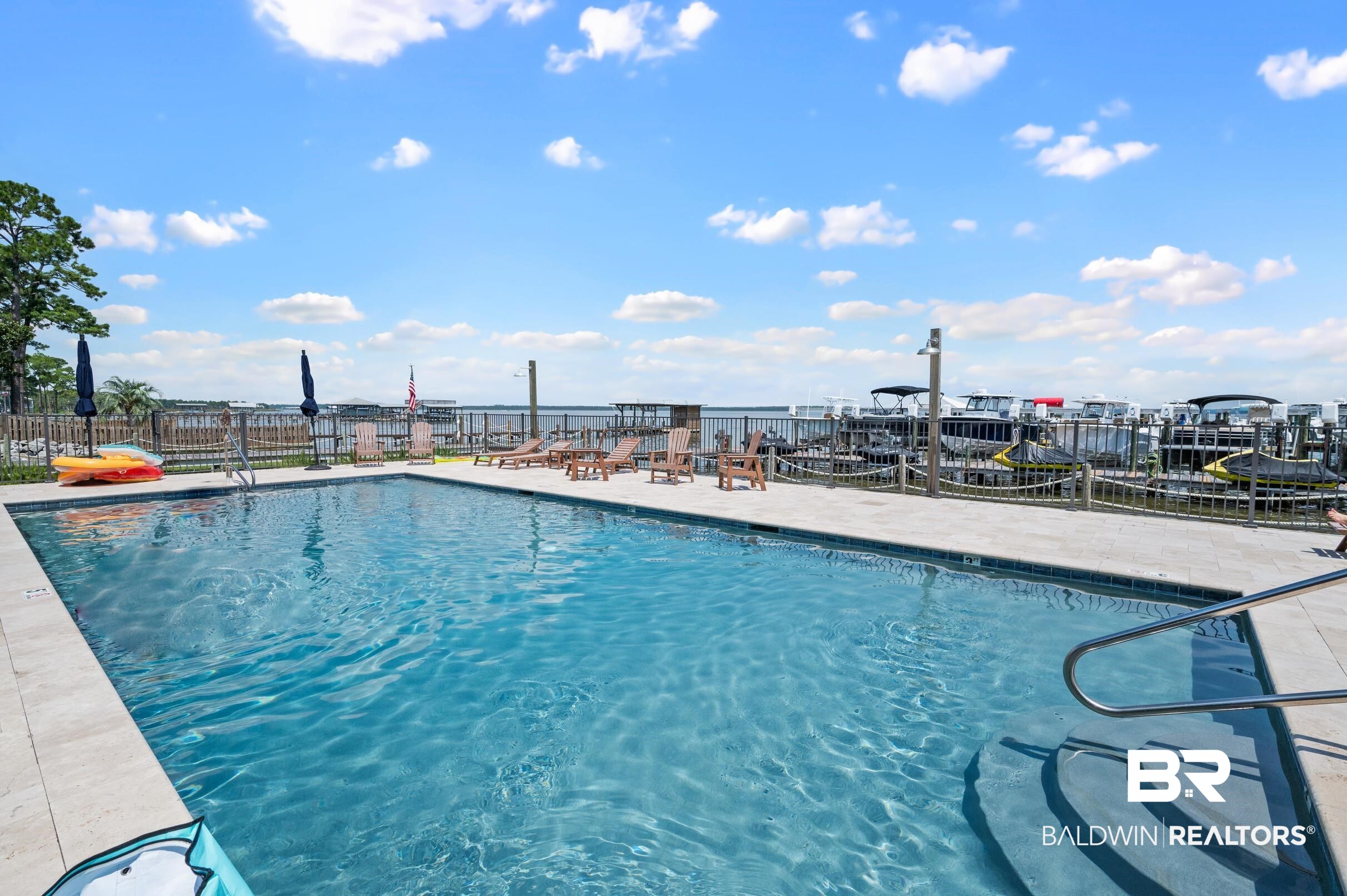 25773 Canal Road, Unit 18 Orange Beach, AL 36561 - Photo 38 of 44 Community pool featuring a patio