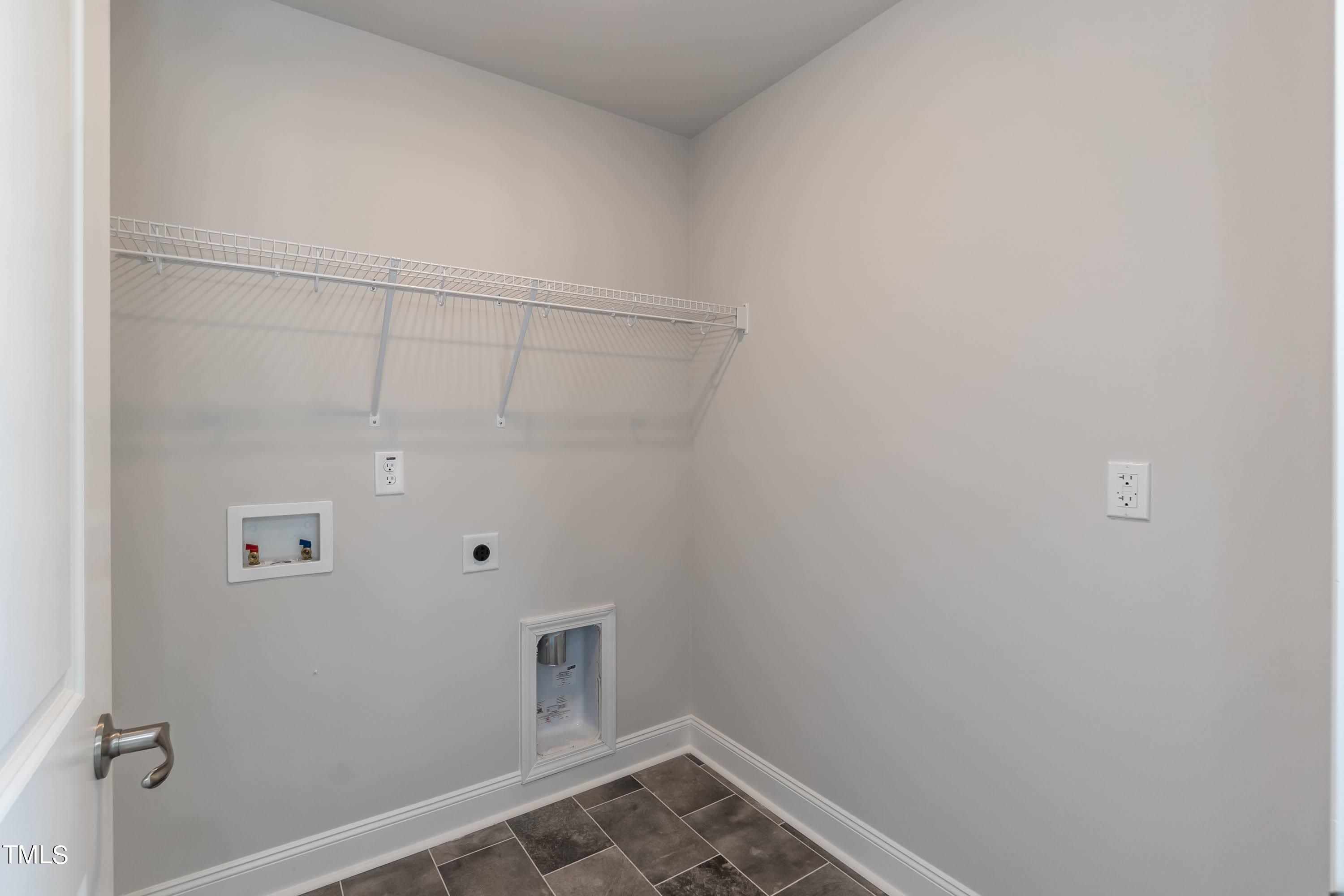 45 High Hampton Way Fuquay-Varina, NC 27526 - Photo 29 of 43 a view of utility room