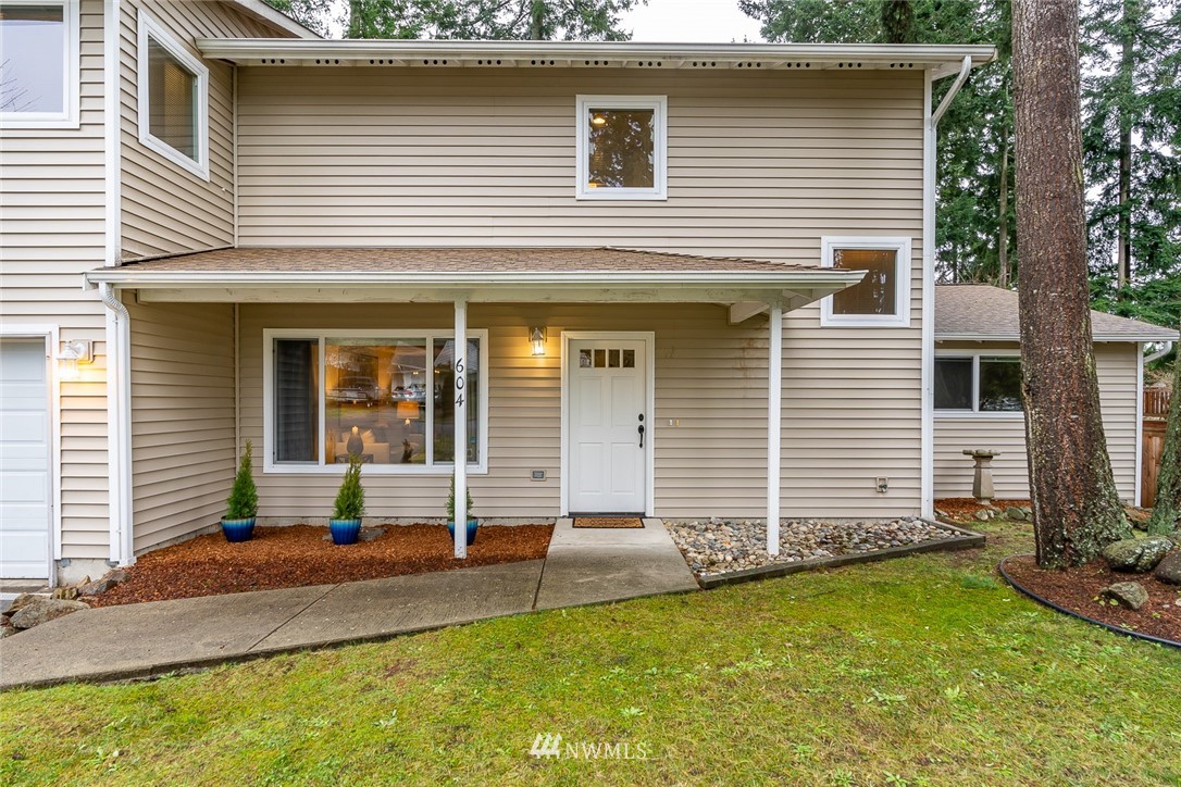 604 216th Street Southwest Bothell, WA 98021 - Photo 2 of 33 a view of a house with backyard