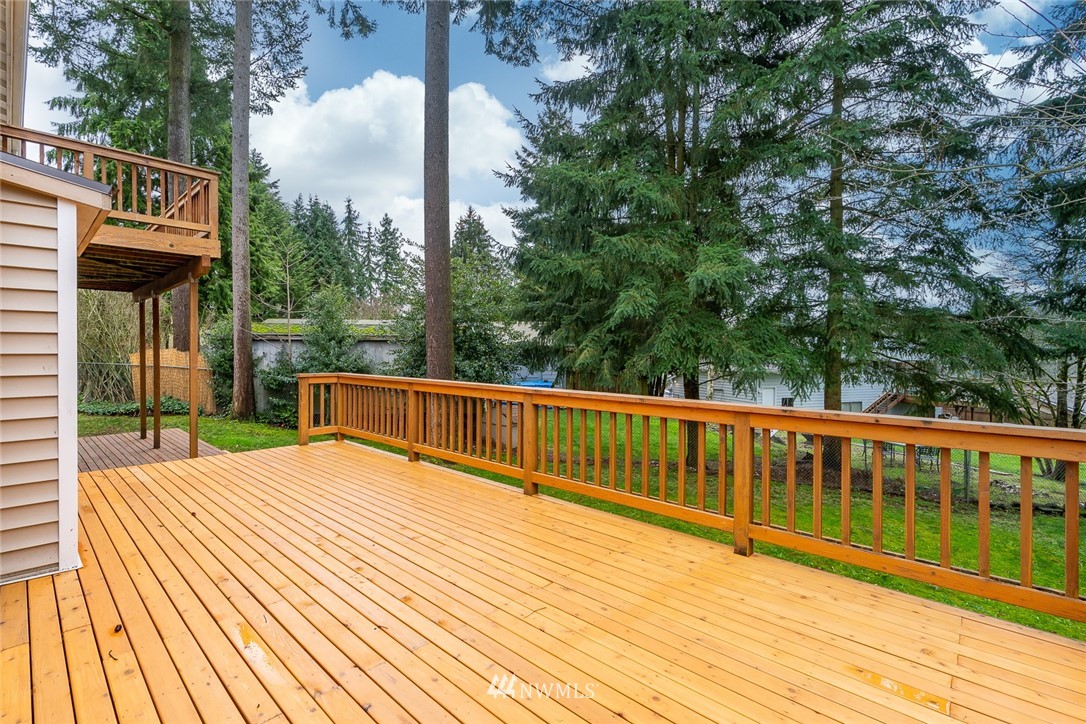 604 216th Street Southwest Bothell, WA 98021 - Photo 15 of 33 a view of balcony with wooden floor and fence