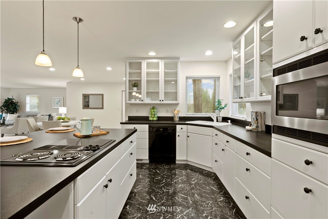 604 216th Street Southwest Bothell, WA 98021 - Photo 23 of 33 a kitchen with lots of counter space and window