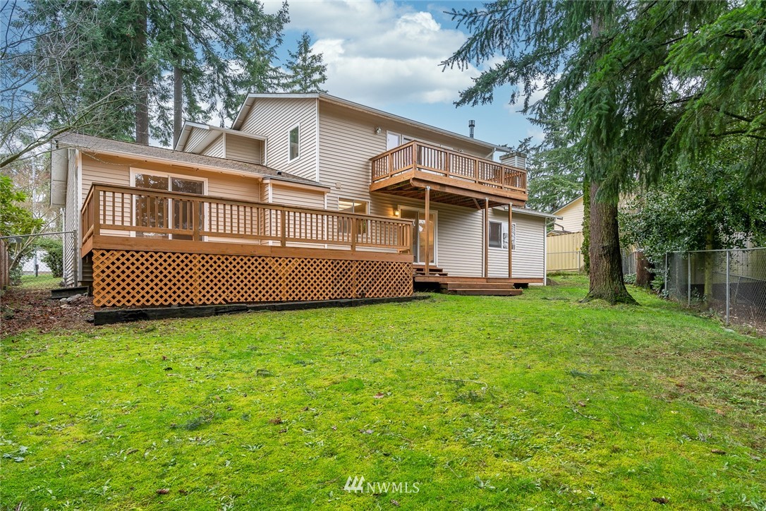 604 216th Street Southwest Bothell, WA 98021 - Photo 33 of 33 a front view of a house with a garden
