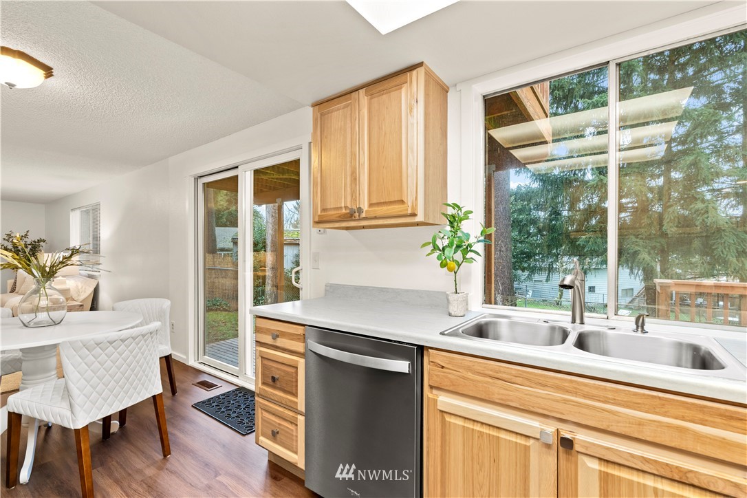604 216th Street Southwest Bothell, WA 98021 - Photo 7 of 33 a kitchen with a sink and a large window