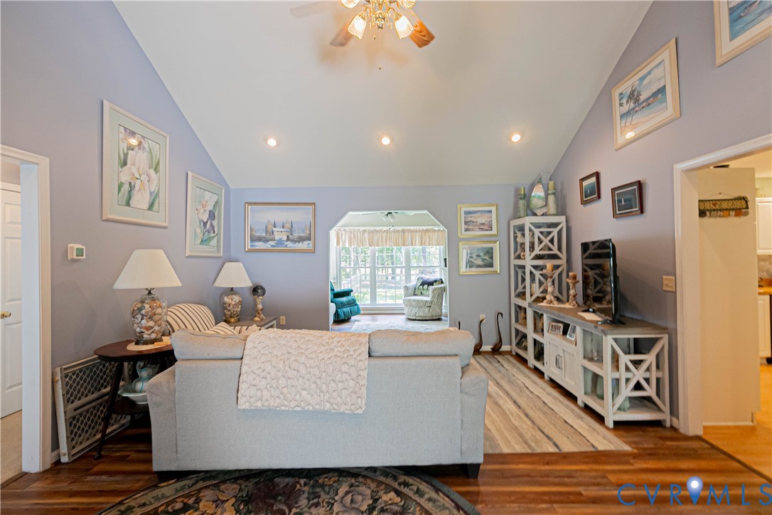 401 Loyalist Drive Ruther Glen, VA 22546 - Photo 11 of 45 a living room with furniture and a flat screen tv