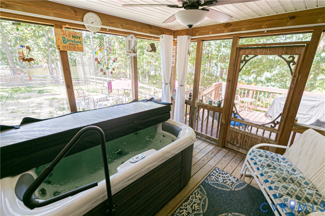 401 Loyalist Drive Ruther Glen, VA 22546 - Photo 23 of 45 a living room with furniture and a large window