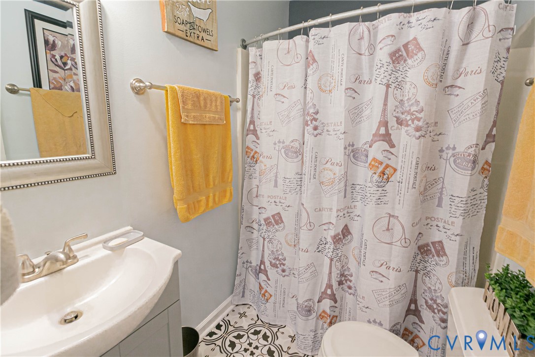 401 Loyalist Drive Ruther Glen, VA 22546 - Photo 34 of 45 a bathroom with a sink and a toilet