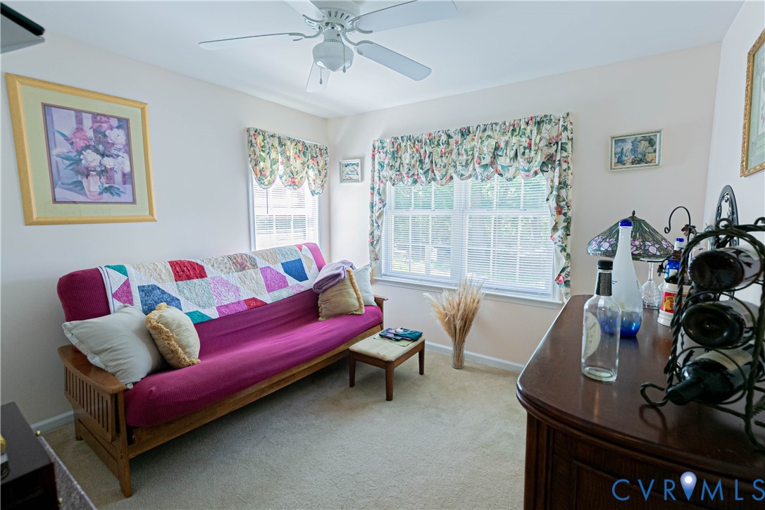 401 Loyalist Drive Ruther Glen, VA 22546 - Photo 35 of 45 a living room with furniture and a window