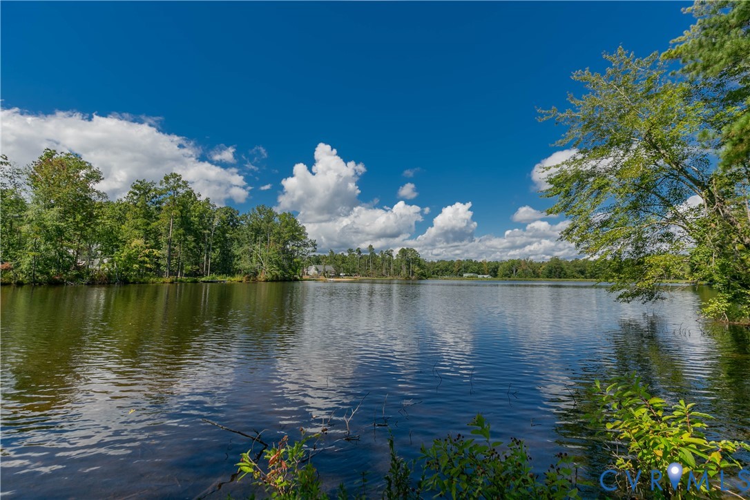 401 Loyalist Drive Ruther Glen, VA 22546 - Photo 6 of 45 a view of a lake with a lake view