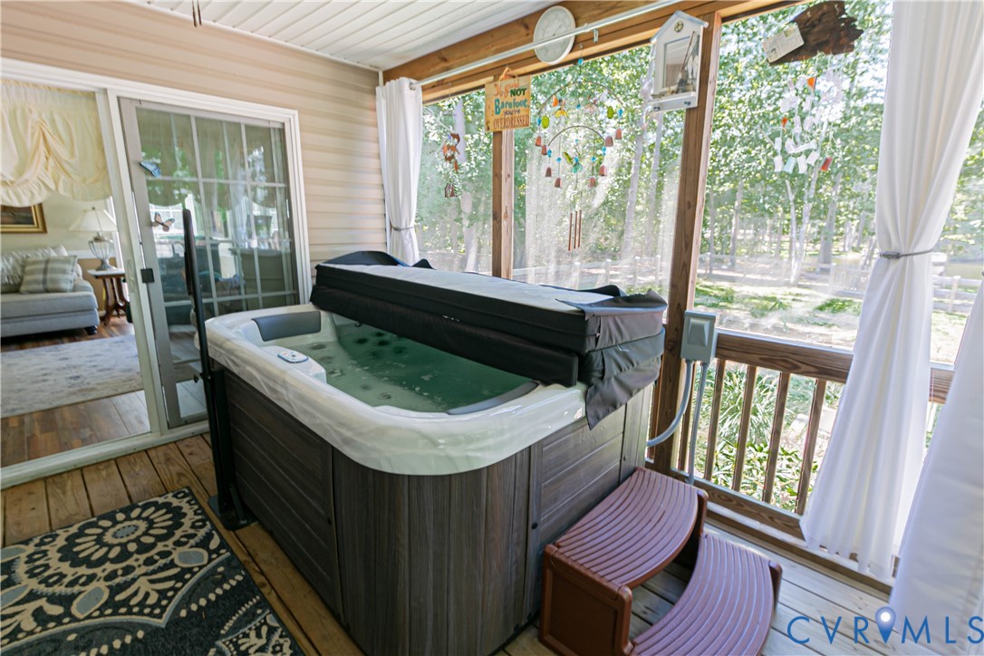 401 Loyalist Drive Ruther Glen, VA 22546 - Photo 8 of 45 a living room with large window and furniture