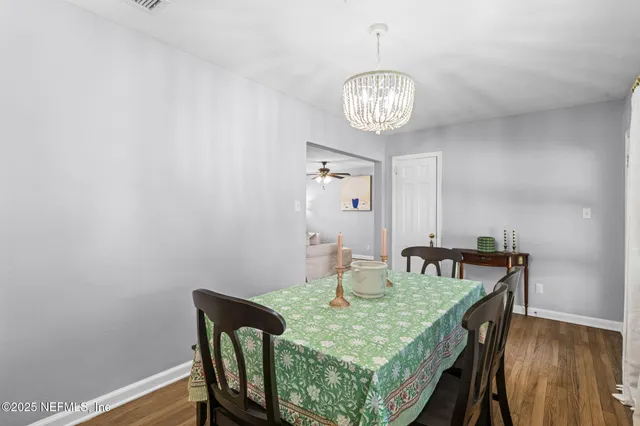 a kitchen with a refrigerator stove and sink