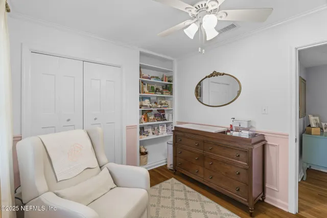 a view of bathroom with toilet and a window