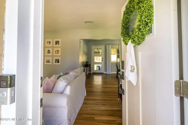 a living room with furniture and a couch