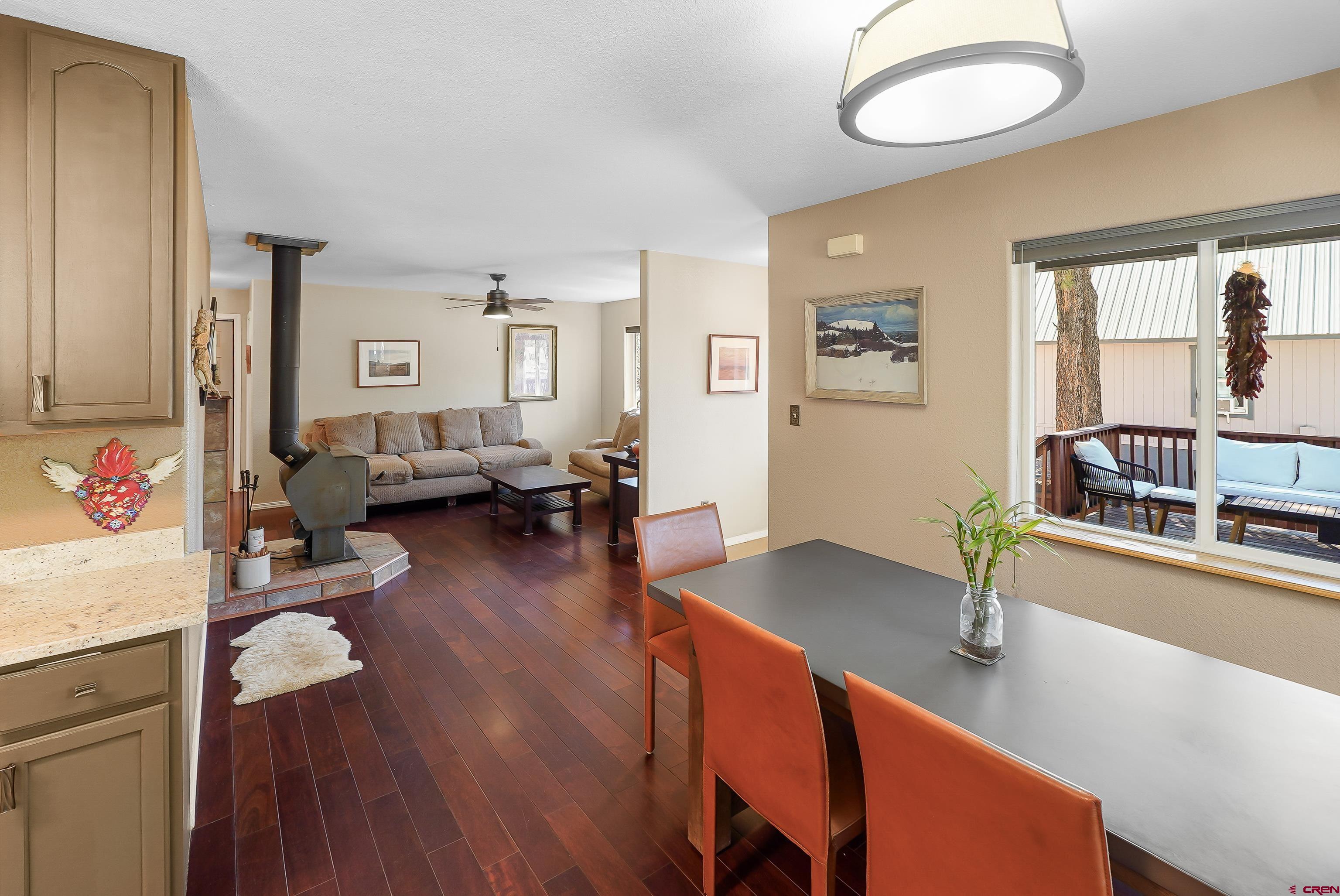 100 Westridge Road Durango, CO 81303 - Photo 15 of 39 a living room with furniture and a wooden floor