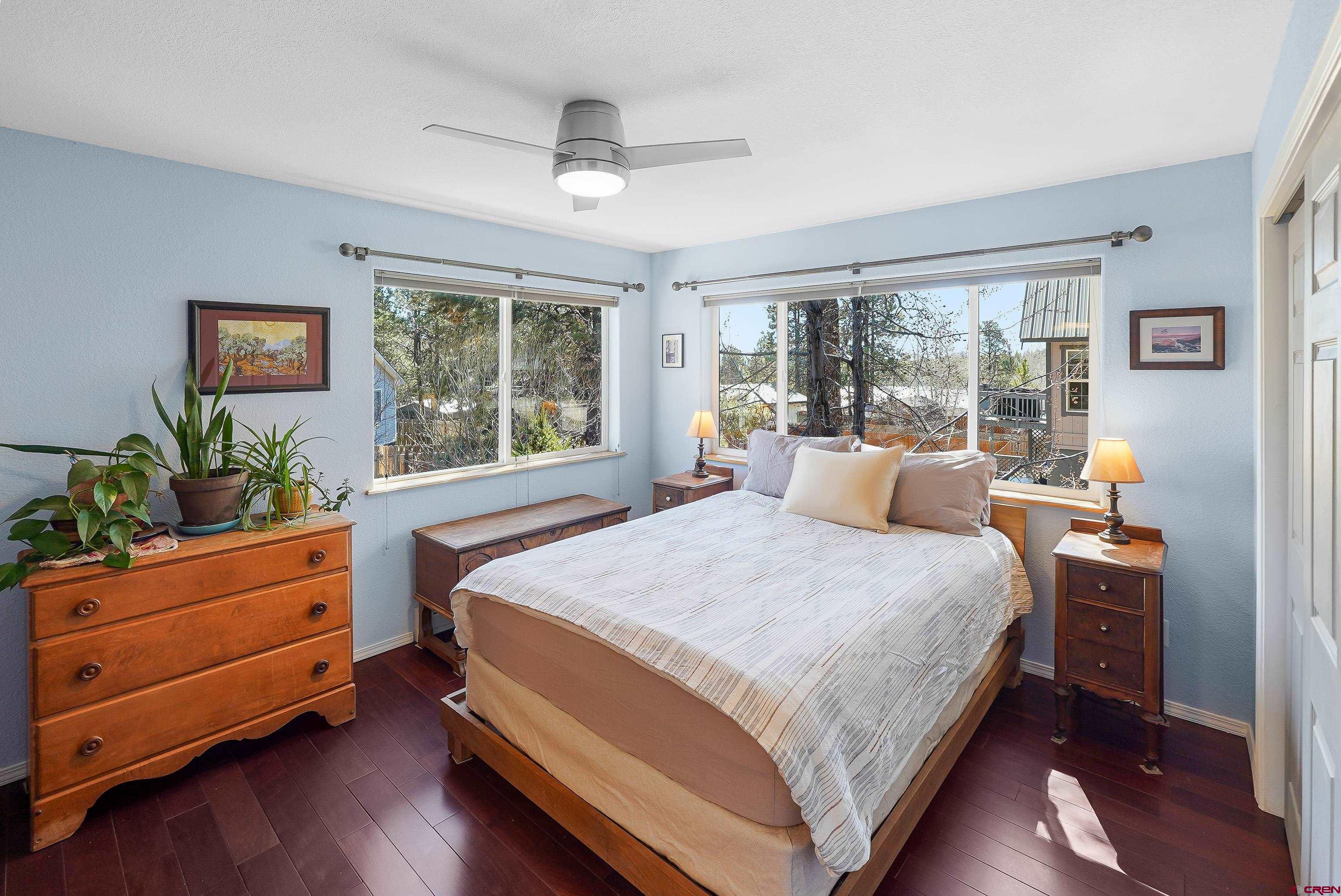 100 Westridge Road Durango, CO 81303 - Photo 16 of 39 a bed room with a bed and a window