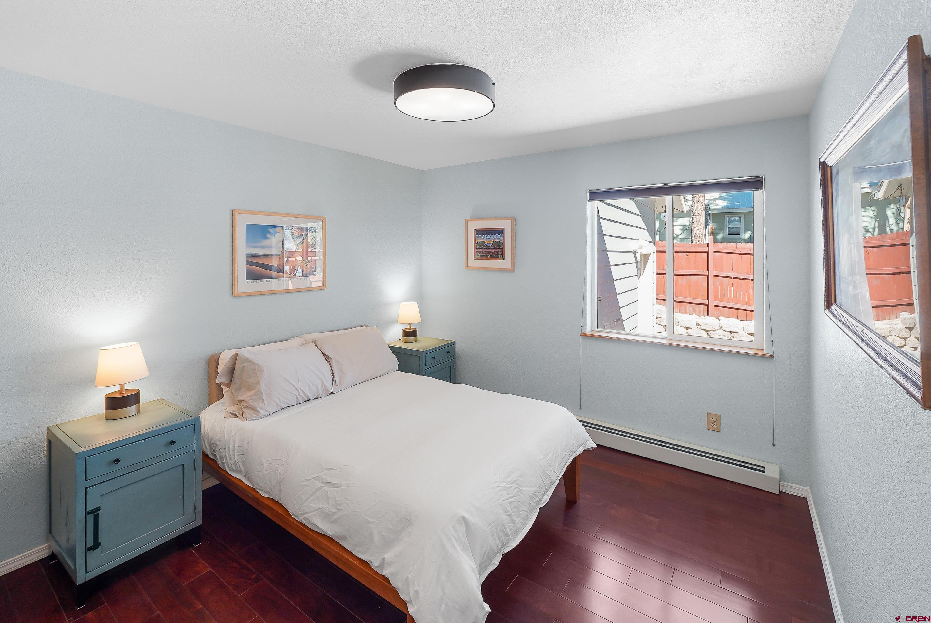 100 Westridge Road Durango, CO 81303 - Photo 21 of 39 a bedroom with a bed and a window