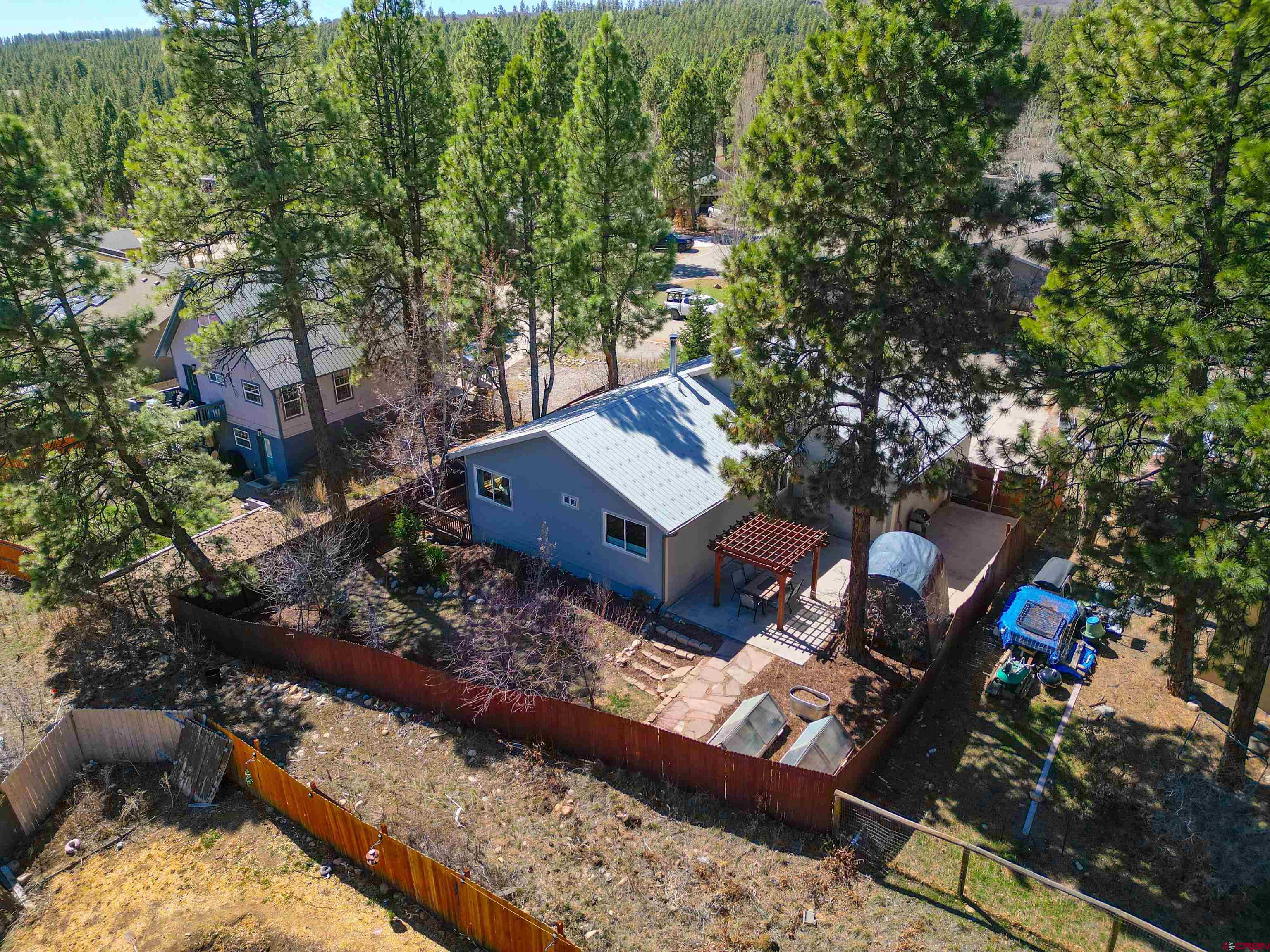 100 Westridge Road Durango, CO 81303 - Photo 26 of 39 a view of a house with a yard and sitting area
