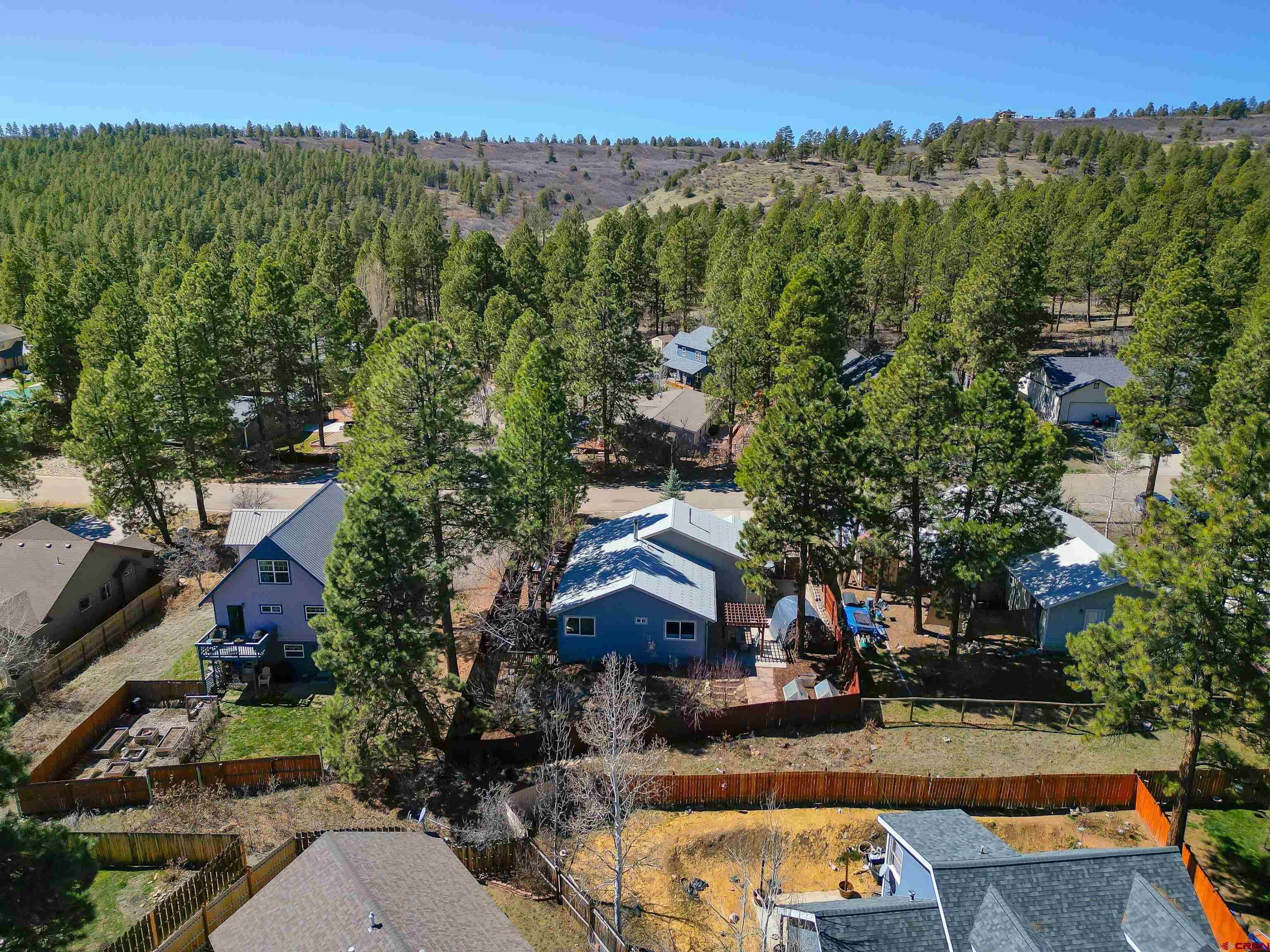 100 Westridge Road Durango, CO 81303 - Photo 27 of 39 an aerial view of a house with swimming pool garden and mountain view