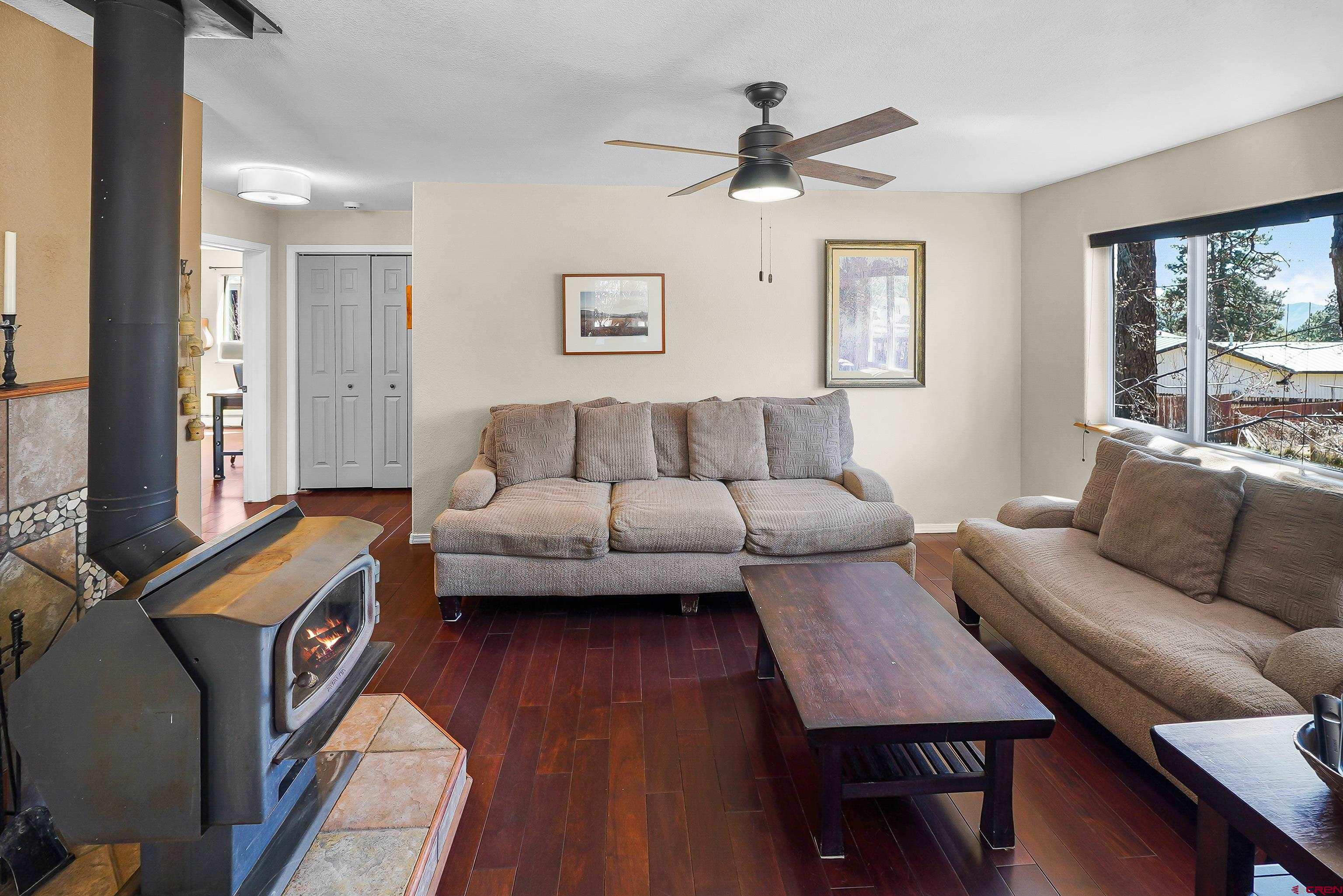 100 Westridge Road Durango, CO 81303 - Photo 6 of 39 a living room with furniture and a window