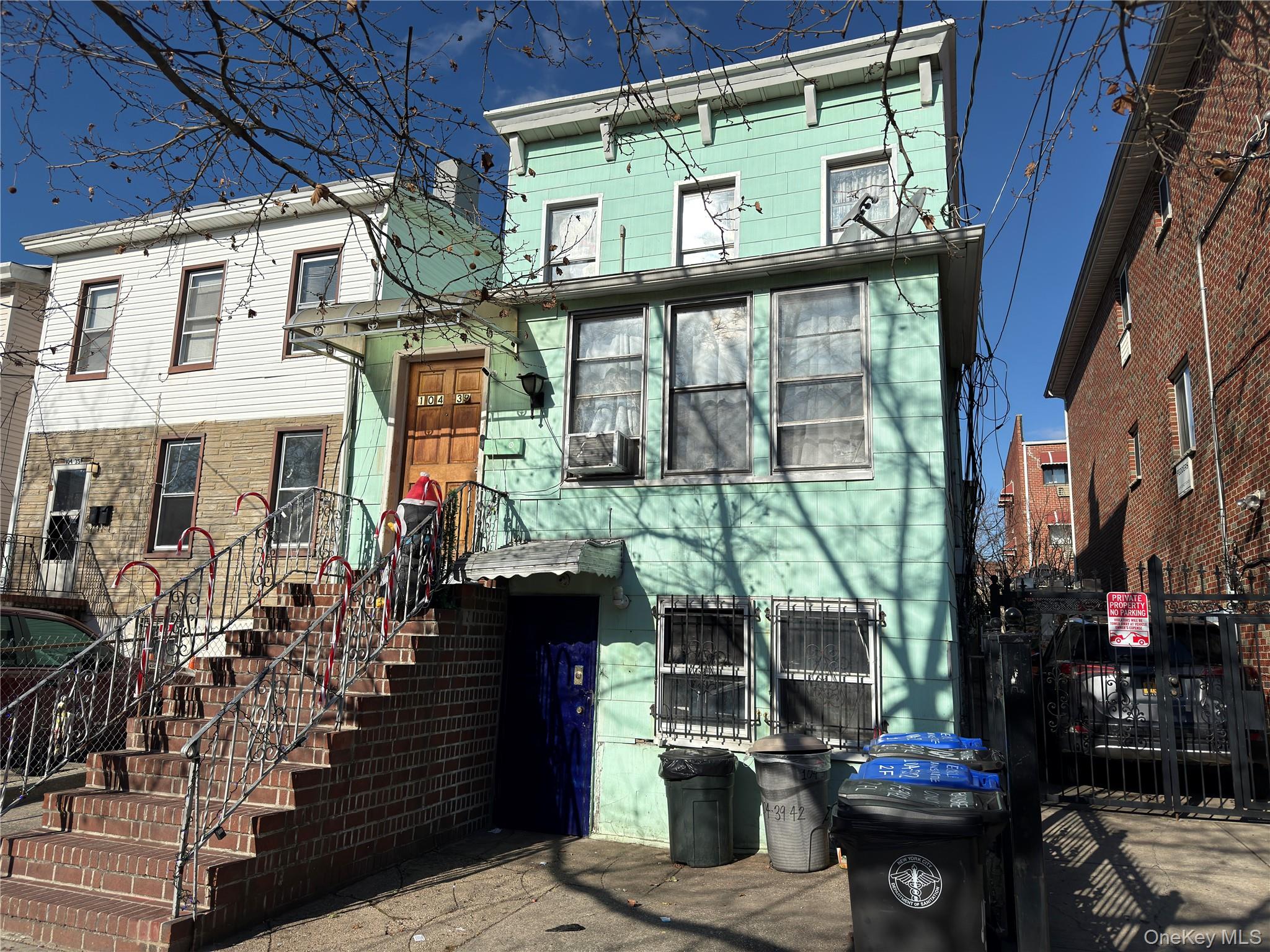 104-39 42nd Avenue Queens, NY 11368 - Photo 3 of 14 Italianate home with stairway
